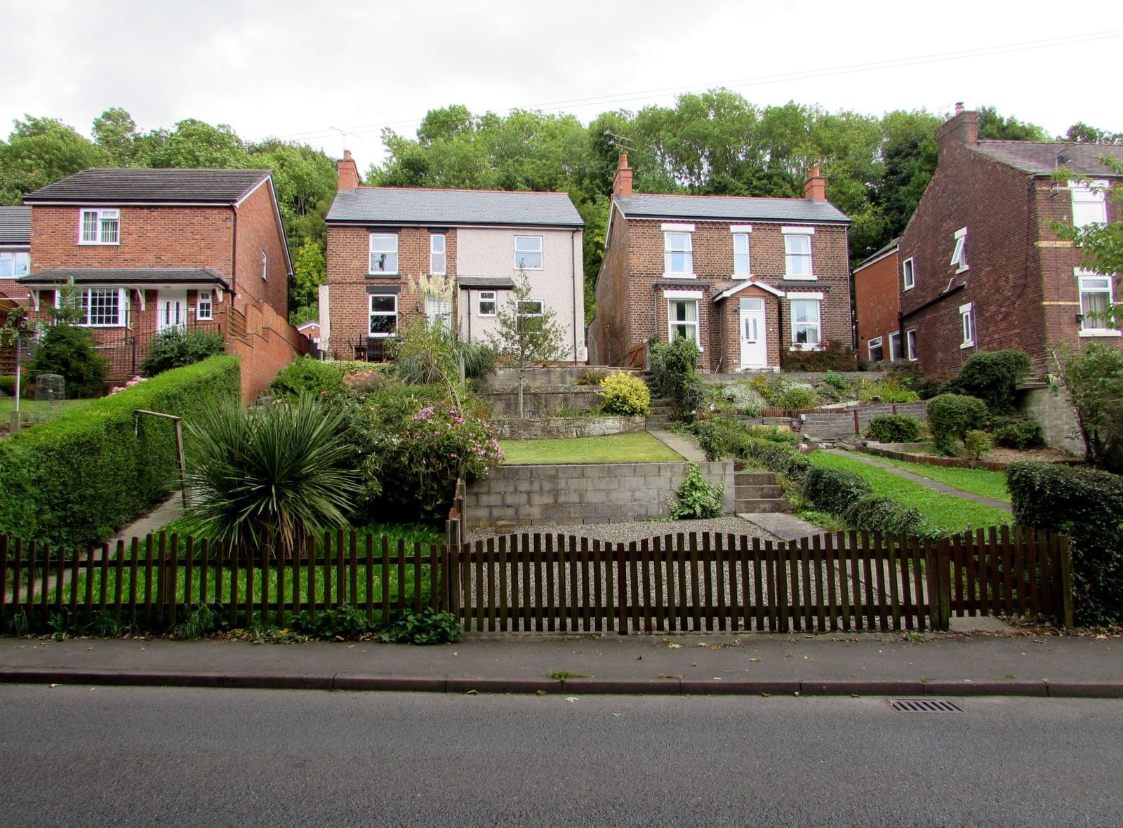 Brick houses with slate roofs on Kent Road, Moss, near Wrexham